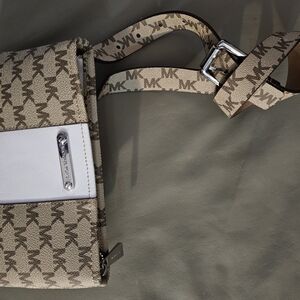 Michael Kors Tan and White Crossbody or Fanny Pack Bag. 9x6 In. Strap 36 In Adju